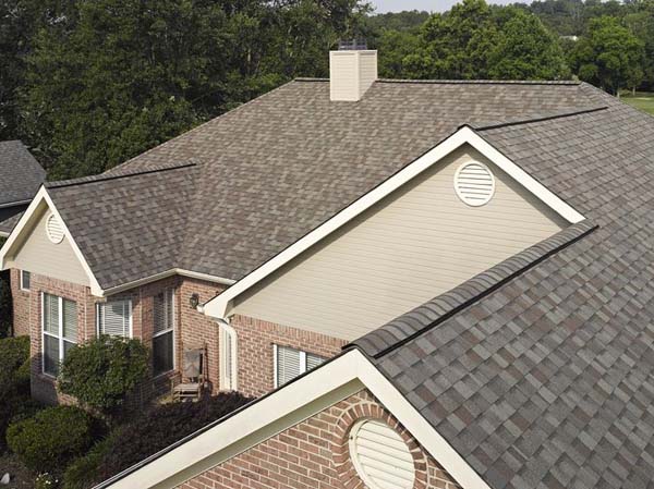 Aerial view of clean residential roof after service